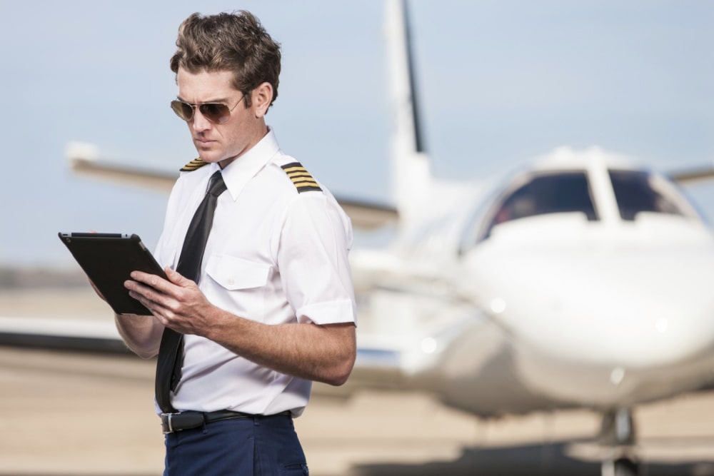 Pilot in front of the plane